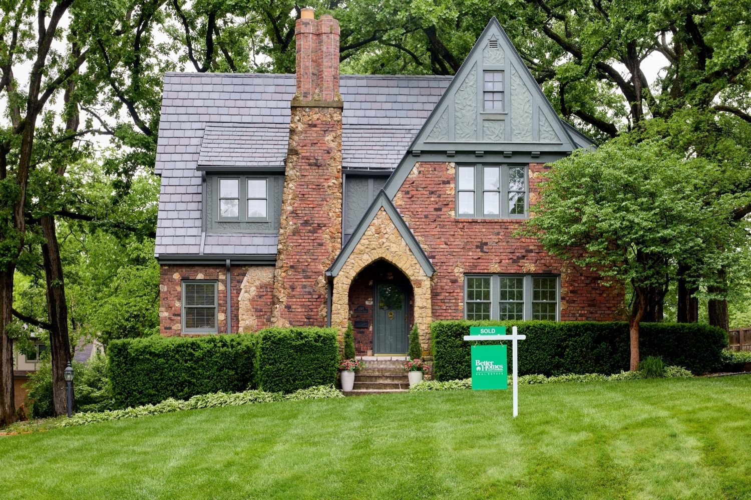 tudor_home_with_listing_sign_h